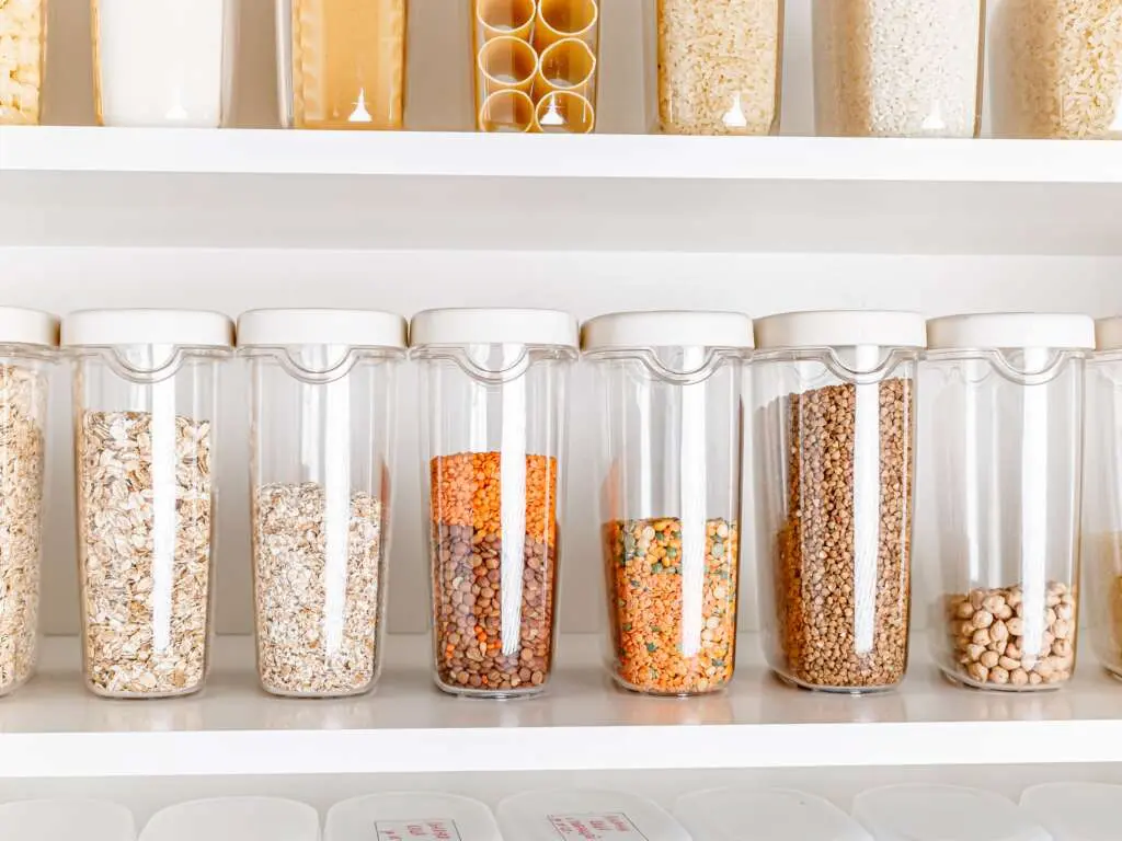 Pantry shelves with sealed food containers to help prevent pantry pests